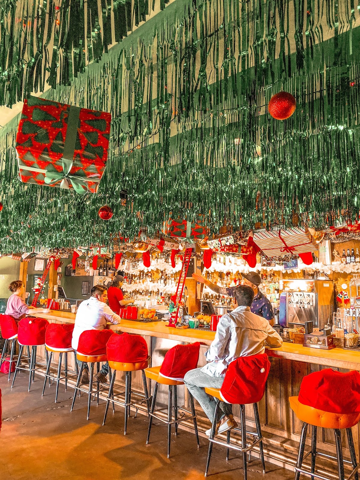 This Christmas Miracle Pop Up Bar in Houston Is Like Visiting Santa’s