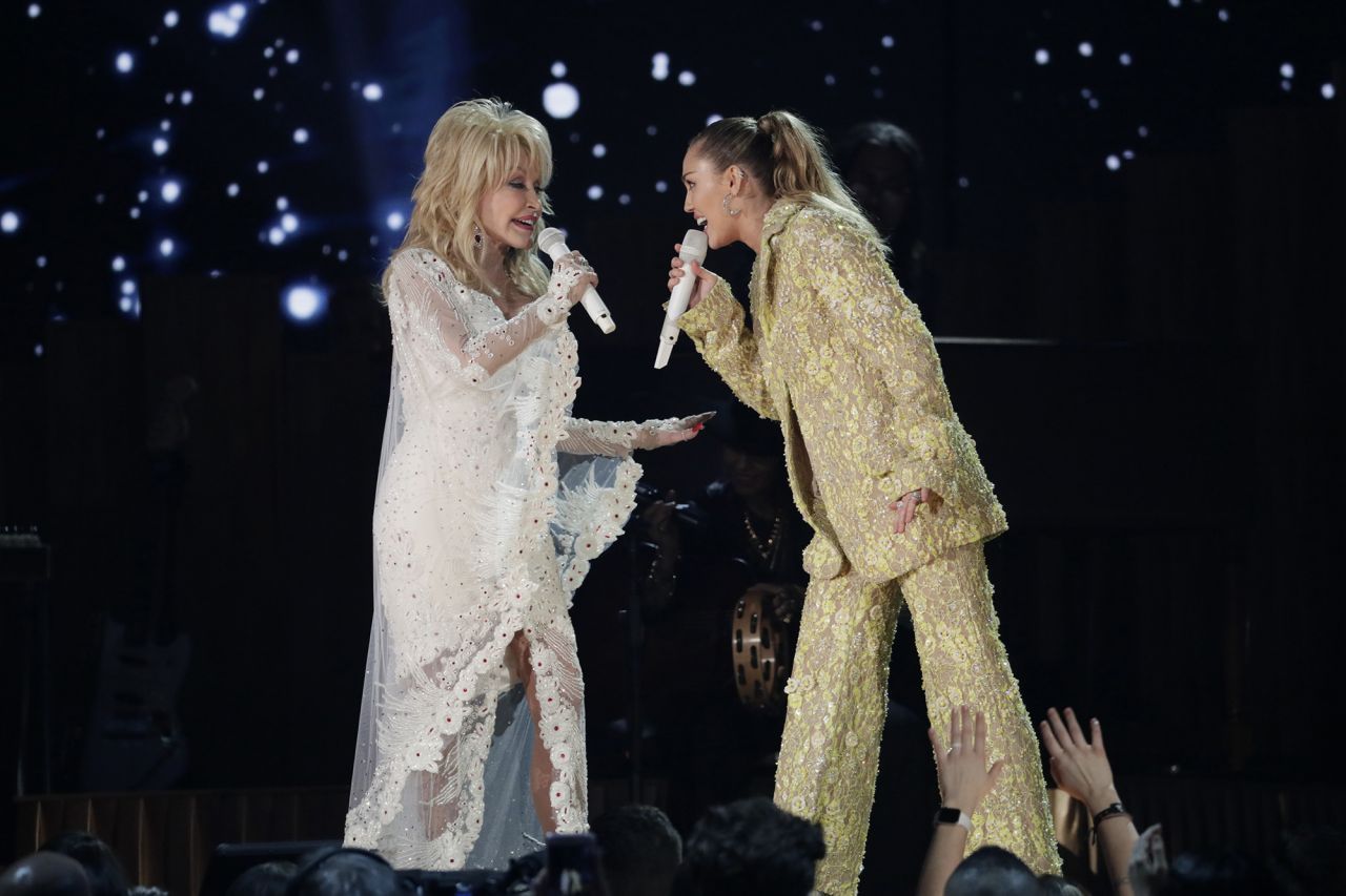 Dolly Parton and Miley Cyrus Perform During the 61st Grammy Awards