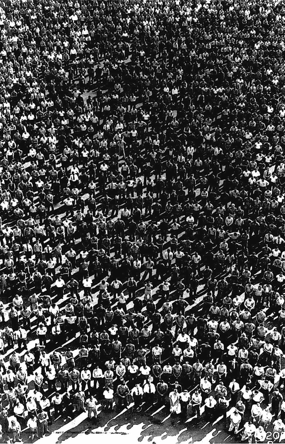 1942 aerial crowd an anonymous 1942 aerial photograph of a crowd of men