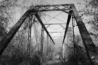 A black and white image of Ghost Bridge, Florence, Alabama