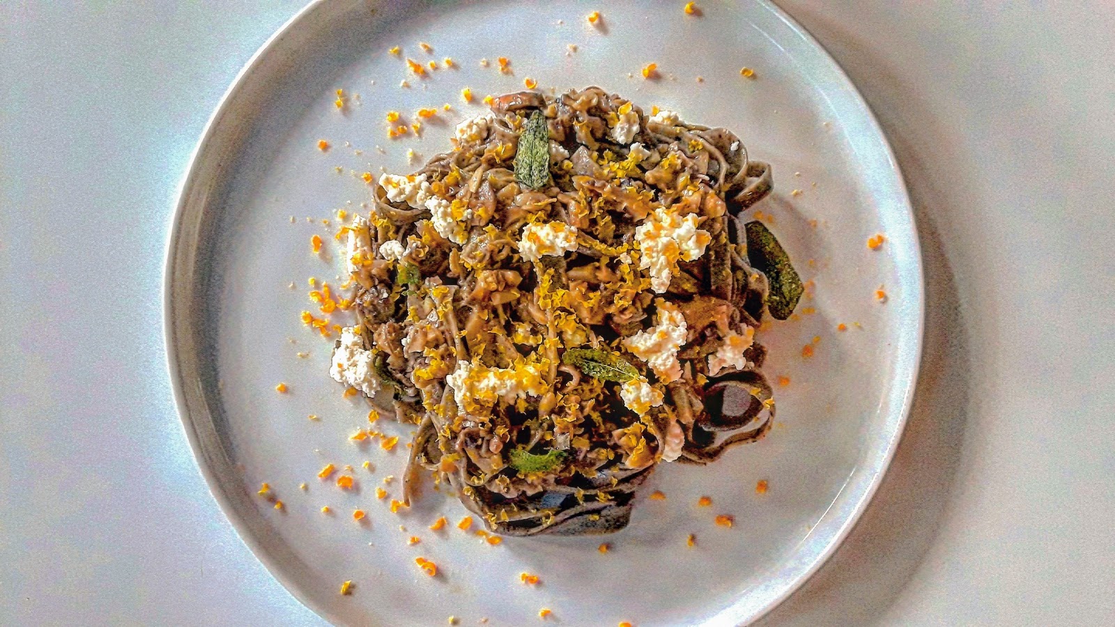 Onion Ash Tagliatelle, Brown Butter Sage, Mushroom Conserva, Ricotta
