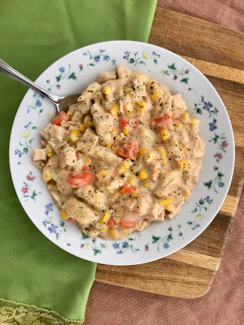 Creamy, thick, and hearty soup that is loaded with tender chicken, sweet corn, carrots, and fluffy rivel dumplings! This is a soup to warm up from the inside out on a cold winter day.