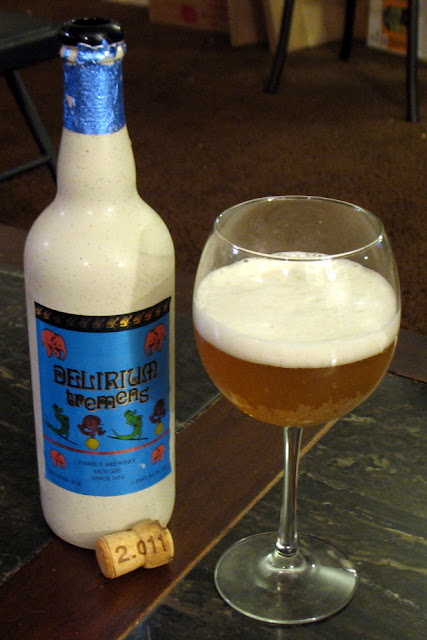 A bottle of Delirium Tremens with glass and cork.  Delicious!