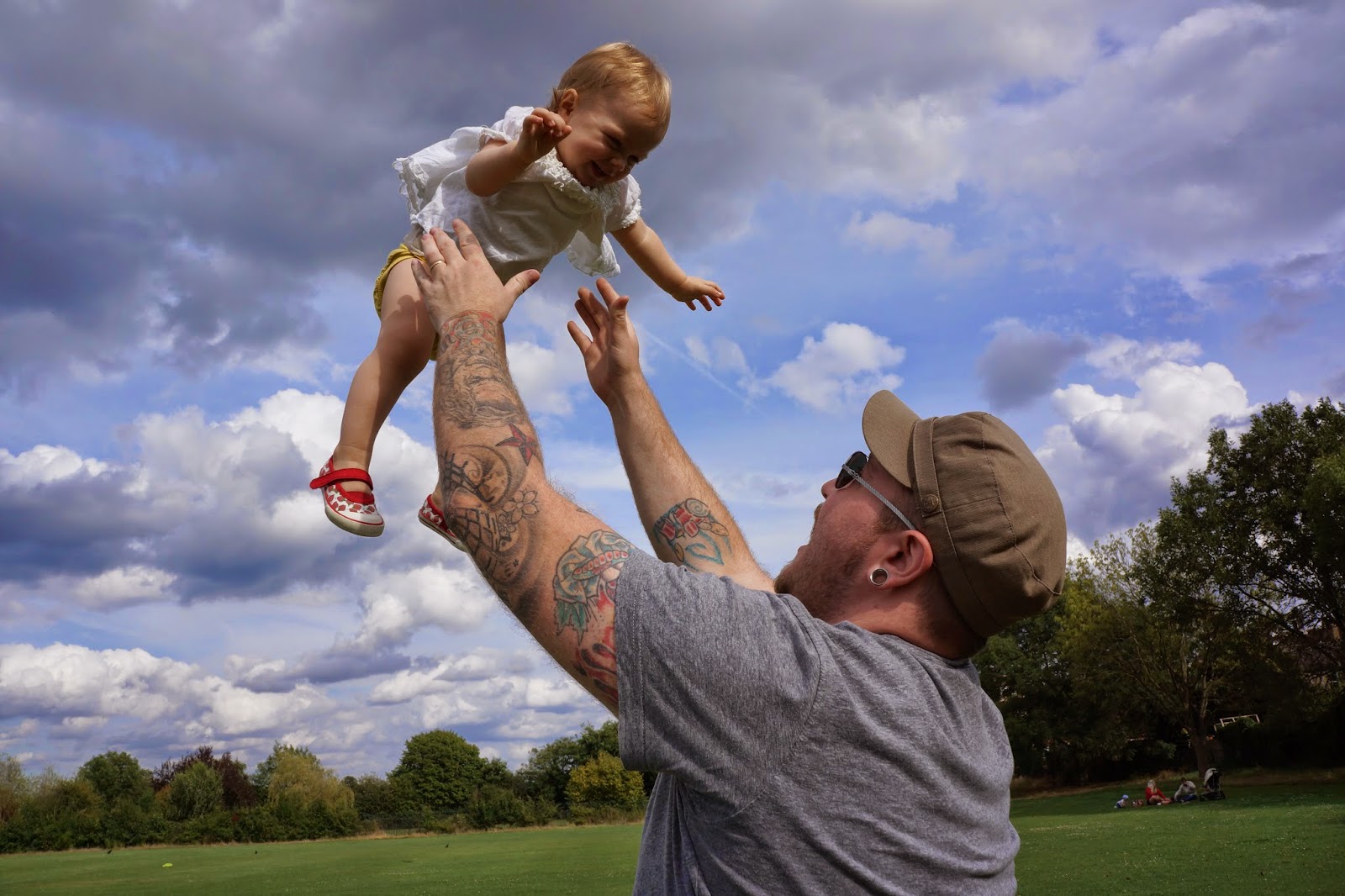 Flying high up in the air parenting differences between mums and dads Wave to Mummy