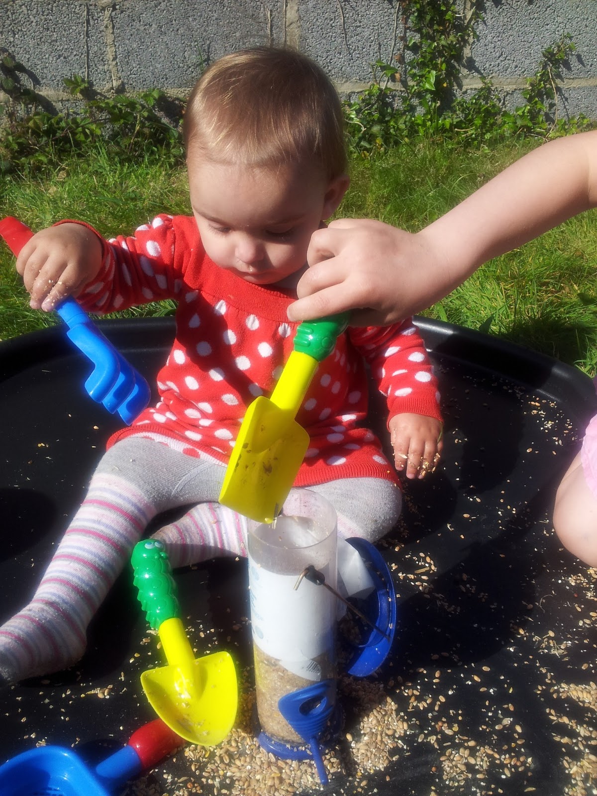 , Planting Sunflower Seeds- Messy Play for Matilda Mae