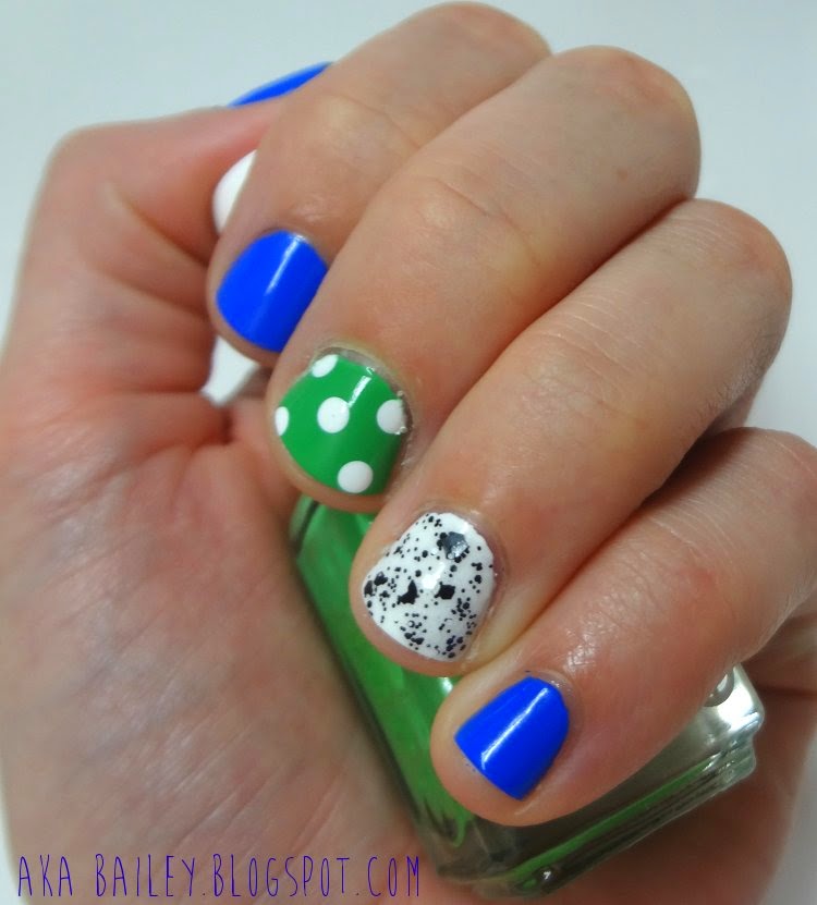 Blue nail polish and two accent nails, polka dots on Essie Mojito Madness