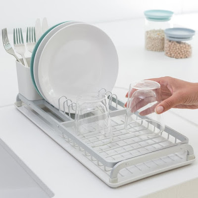 dish rack with slots for plates, with a place for glasses in front and silverware behind