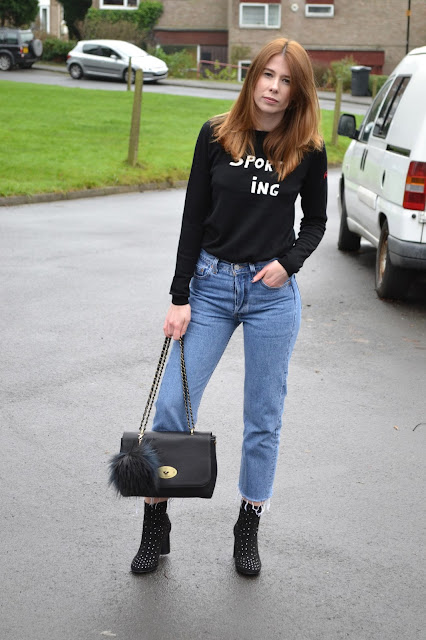 Bella freud jumper from Fred perry, Blue vintage Levis 501 with black studded boots from ASOS. Mulberry style bag with river island pom pom. Affordable women's fashion blog. Alexa chung style. Vogue  