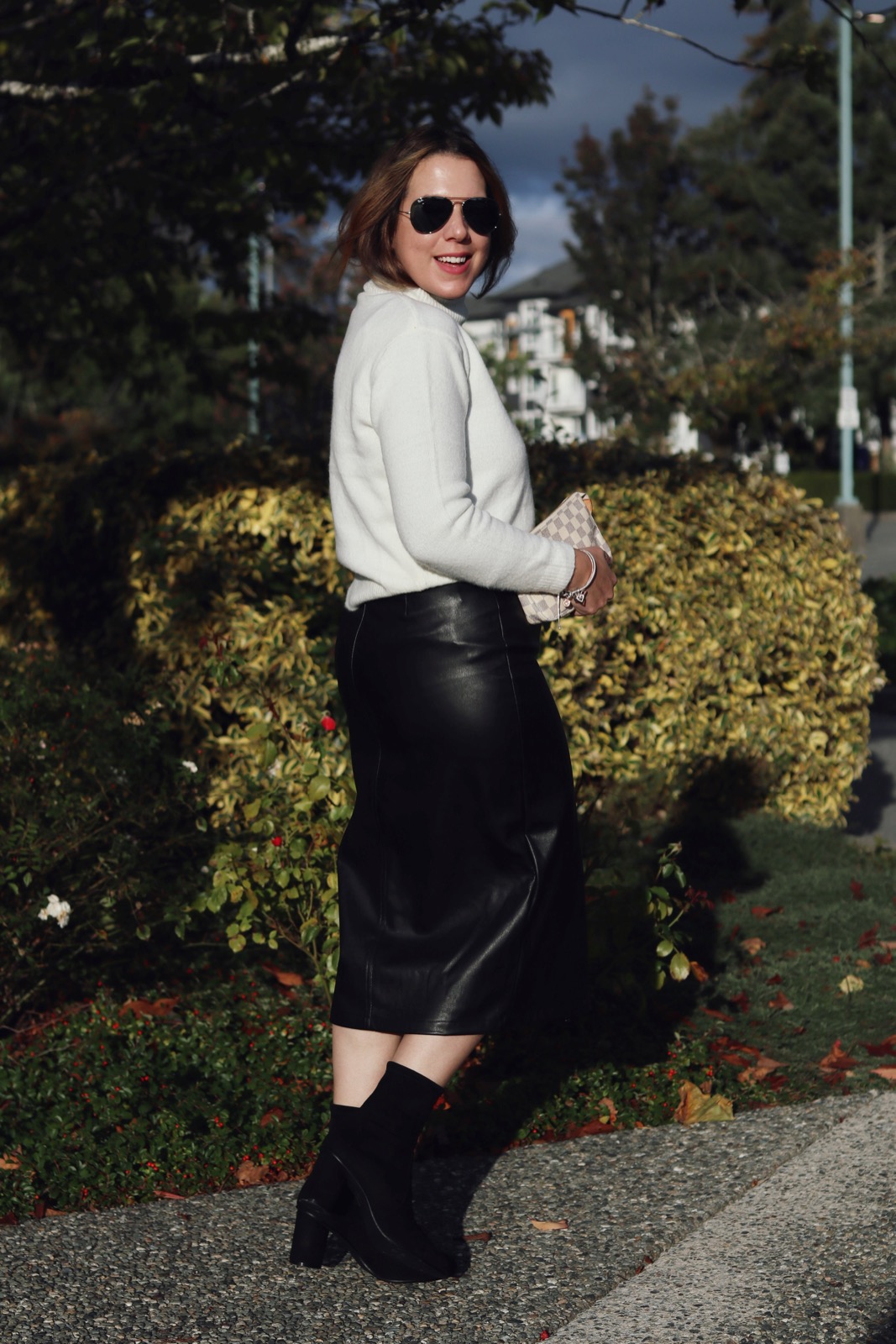 Le Chateau mock neck sweater and faux leather skirt outfit