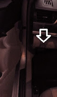 Look for the Tab on the left side of the steering wheel To open this hood, look for the pull out tab on the left side of the steering wheel
