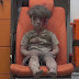 Disturbing image of 5 year old boy injured and bloodied during airstrikes