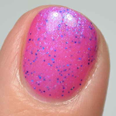 purple shimmer nail polish close up swatch