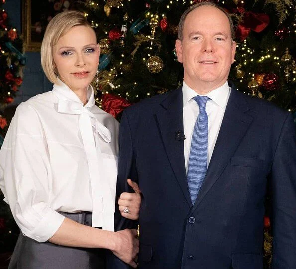 Princess Charlene wore a new white poplin tie-waist shirt from Prada. Princess Gabriella