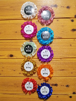Colorful mini rosette ribbons Our rosette ribbon has a cheaper but equally beautiful alternative. It's composed of organza ribbon turned into ruffles.