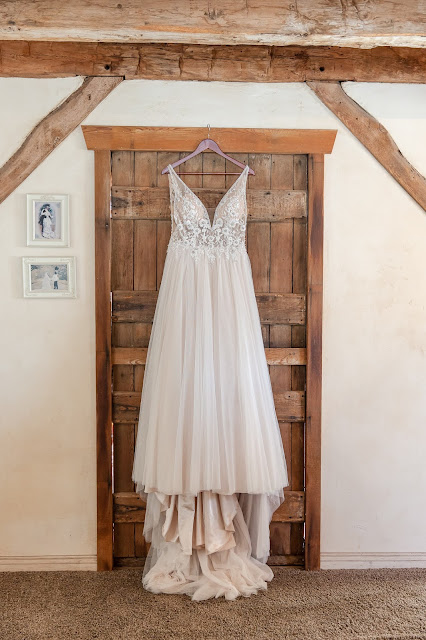 wedding dress hanging at shenandoah mill