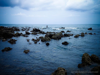 Cloudy Fishing Beach Panorama With Coral Reefs At Umeanyar Village, North Bali, Indonesia