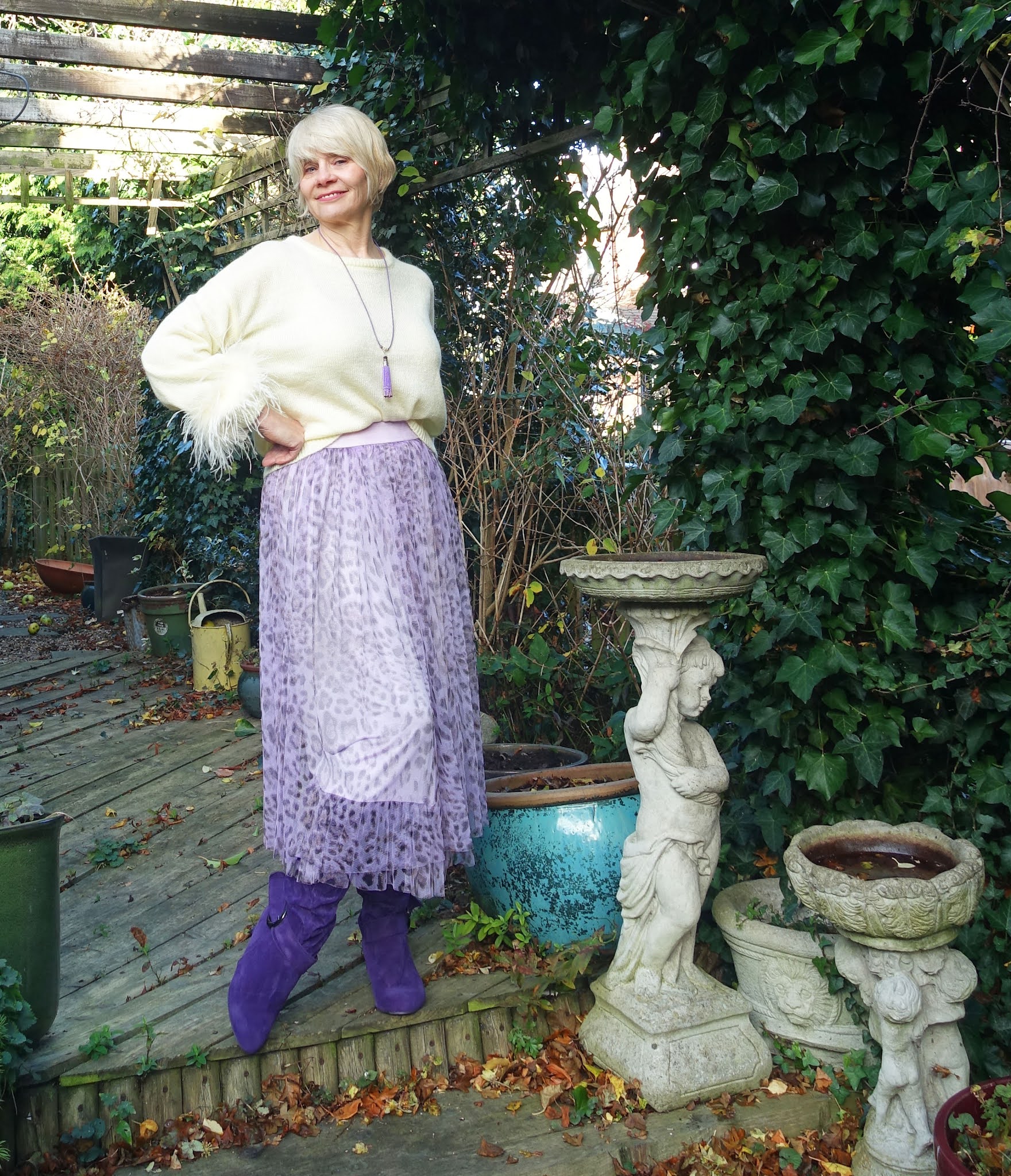 Gail Hanlon from Is This Mutton in festive finery for the Style Not Age Challenge - lemon maribou trimmed jumper and lilac leopard tulle skirt