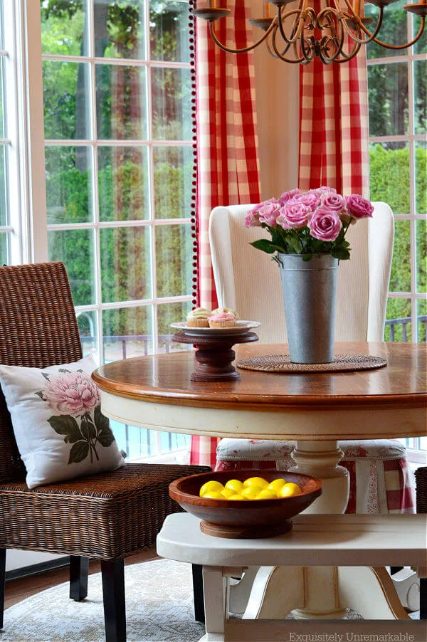 Cottage Kitchen Dining Area with roses on table and on pillow