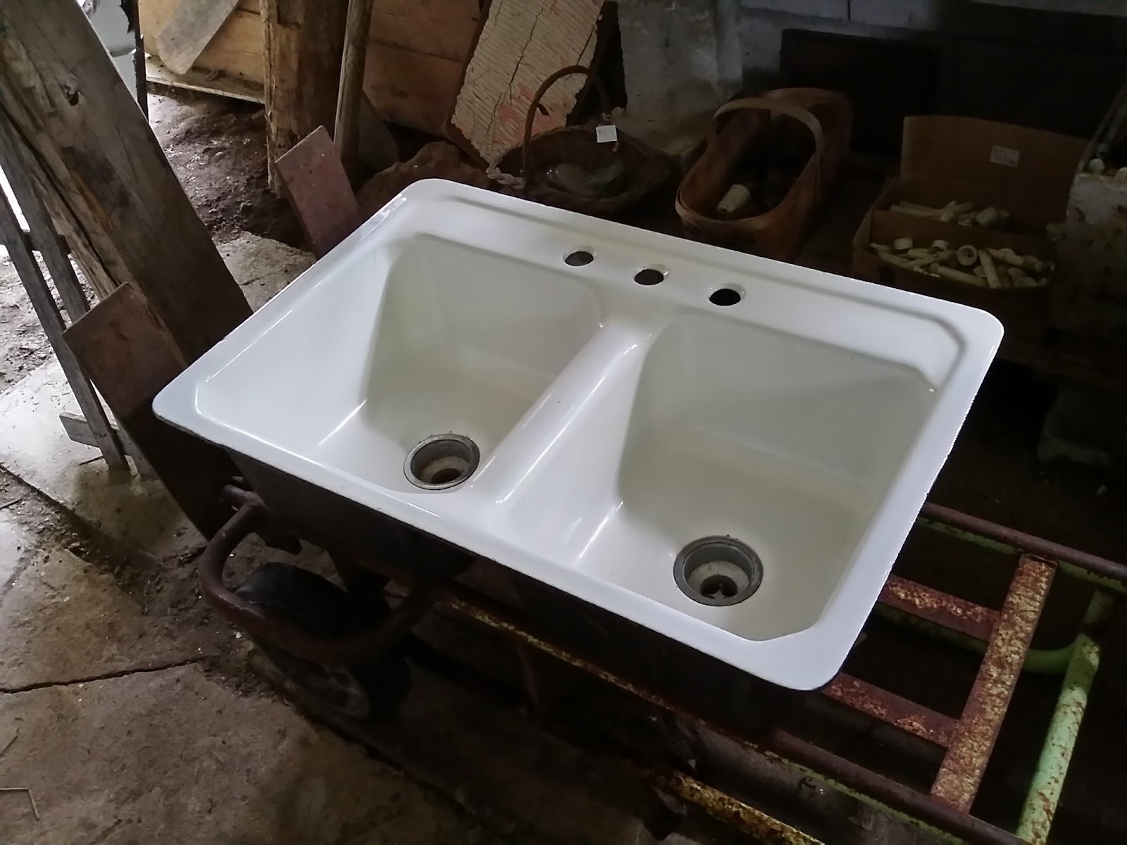 Balleycanoe and Co. Two Cast Iron Enamel Kitchen Sinks.