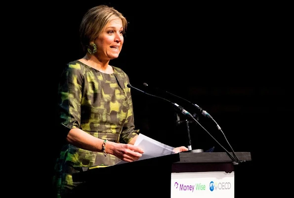 Dutch Queen Maxima attend the opening of the OECD Global Symposium. Queen Maxima wore Natan Dress, Bodes and Bode Earrings