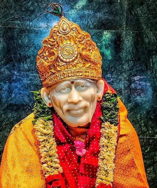 Orange Color Clothes wear Sai baba in this images 