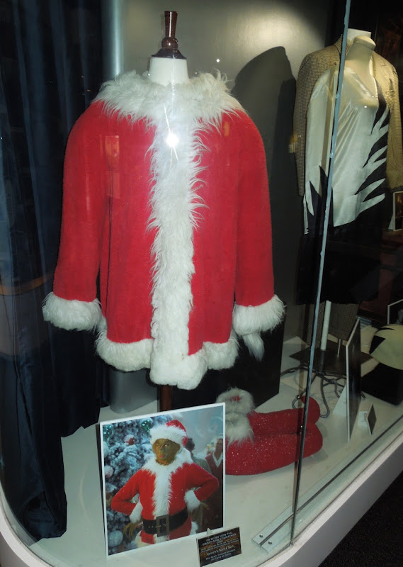 Jim Carrey Grinch Santa suit