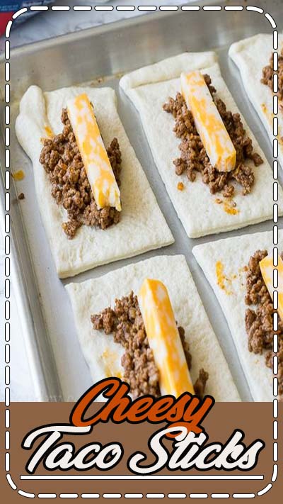 These super simple Cheesy Taco Sticks are buttery breadsticks filled with taco meat and lots of cheese! Perfect for snacking or watching the big game!