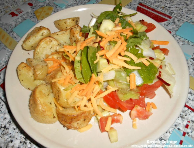 Super Easy Homemade Potato Wedges - My favourite way to enjoy these yummy wedges is with a huge, crispy salad, with a sprinkle on top of cheddar cheese and a little dish of ranch to dip the wedges :-)