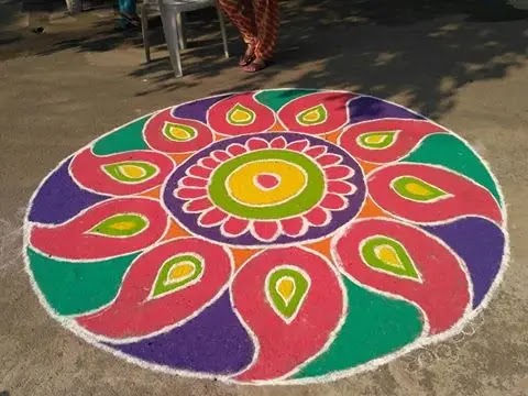 Round colorful design Big-art-with-very-colourfull-muggulu-pattern