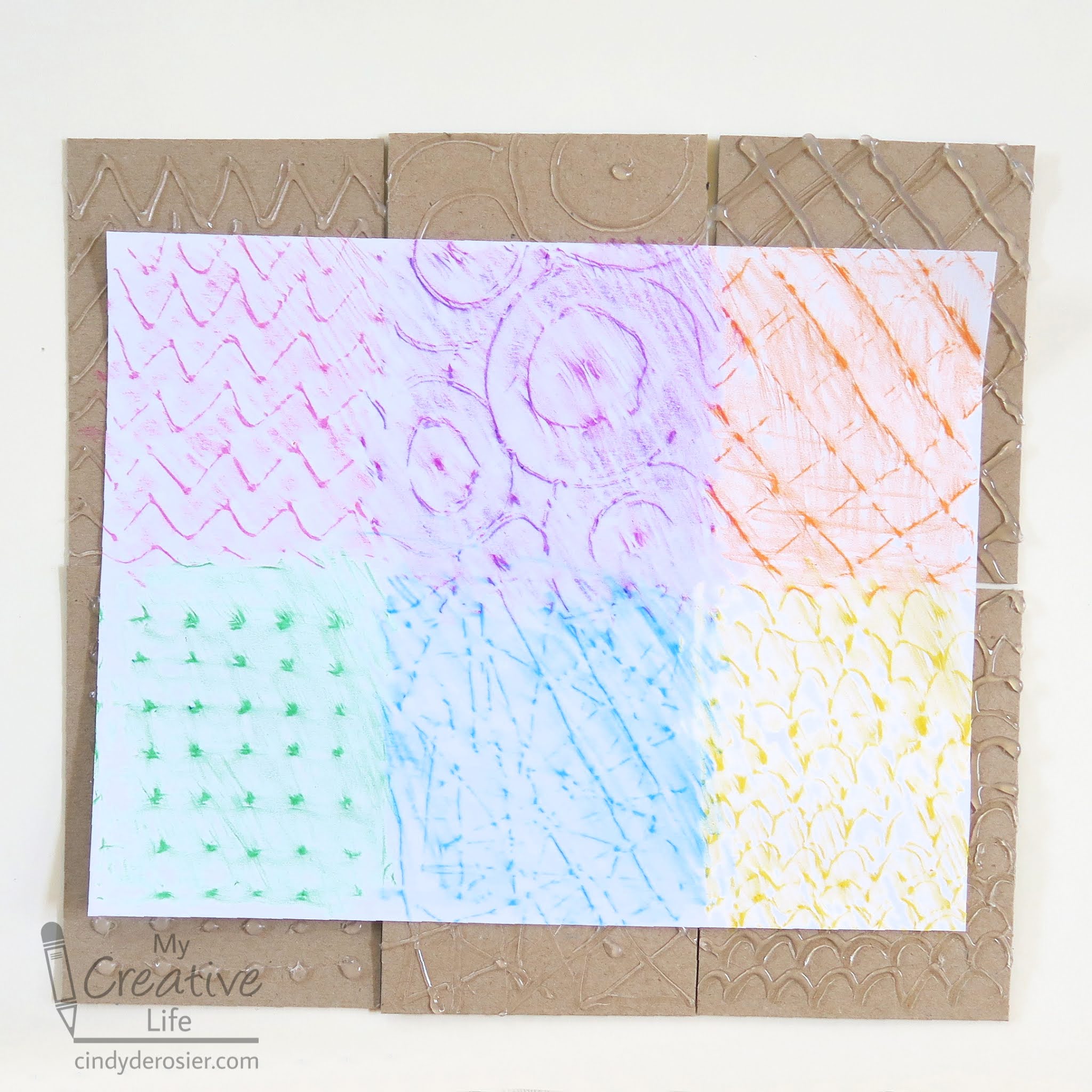 Cindy deRosier My Creative Life Crayon Rubbings over Hot Glue Texture Plates
