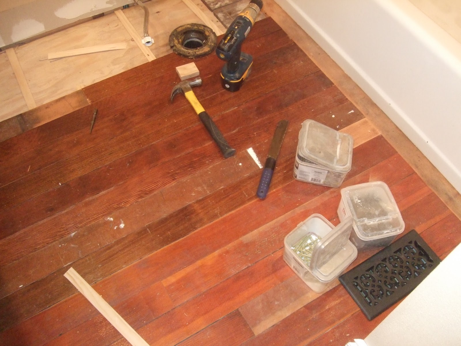 The Smiths Laying bathroom wood flooring