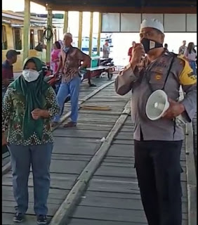 Menyosong New Normal di Pulau Barrang Lompo, Bhabinkamtibmas Imbau Warganya