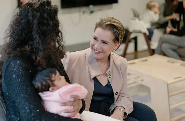 Grand Duchess Maria Teresa visited the Zoé and Yua groups at Norbert Ensch Reception Center in Luxembourg red cross