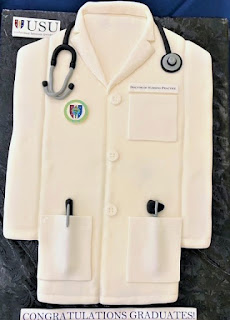 A cake shaped like a lab coat