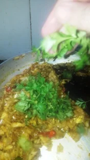 add-coriander-leaves-to-the-ghotala