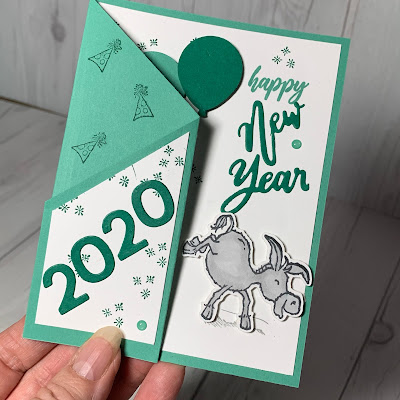 2021 New Years greeting card with donkey kicking 2020