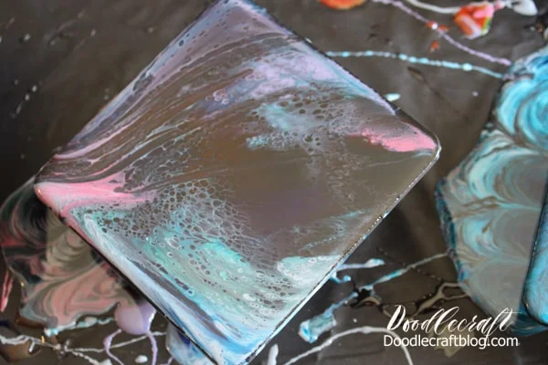 How to make resin galaxy coasters using the dirty pour technique to get amazing cells on a black canvas