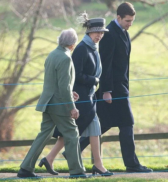 The Queen wore a bright orange jacket and a furry black hat, while Princess Anne donned a  navy coat.  Dame Kiri Te Kanawa