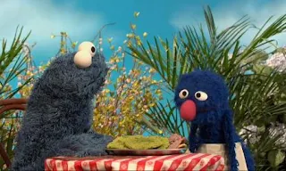 Cookie Monster becomes a customer of Grover's restaurant. This is a veggie cookie restaurant. Sesame Street C is for Cooking