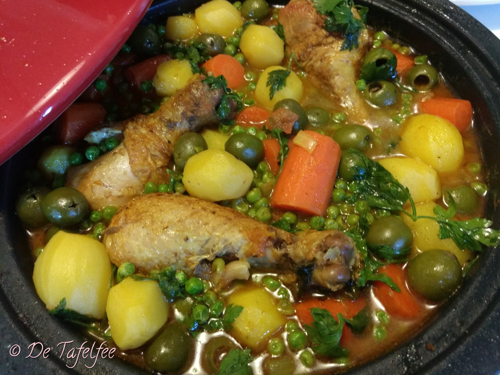 Tajine met drumsticks en groenten