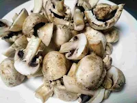 Button mushroom cut into halves for chilli mushroom recipe