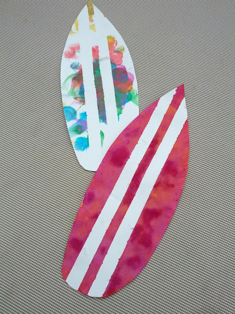 Colorful tape resist surfboard craft for toddlers and preschoolers