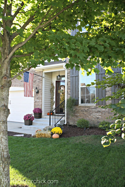 simplified landscaping in front of house