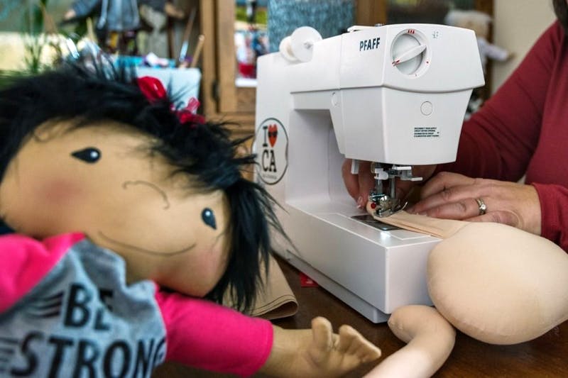 A Woman Creates Dolls For Children That Differ
