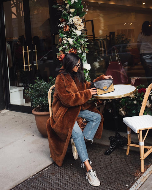 Faux fur coat in brown