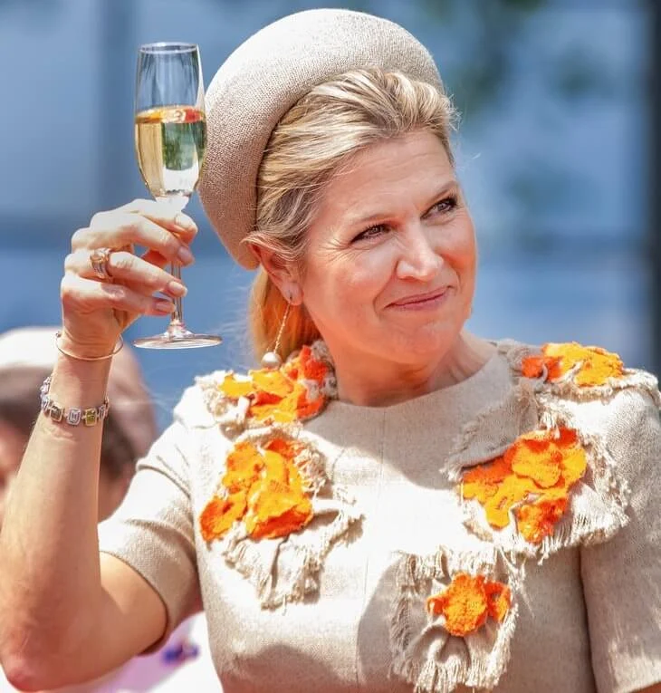 Queen Maxima's outfit is from the fashion house Natan. Natan top and trousers