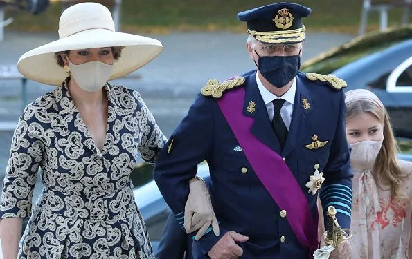 Crown Princess Elisabeth, Prince Gabriel, Prince Emmanuel and Princess Eleonore. Queen Mathilde outfit is by Belgian fashion house Natan