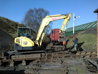 Extracting Vic and the hired excavator over Marley Hill crossing