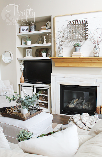 http://www.thriftyandchic.com/2011/09/diy-fireplace-surround.html