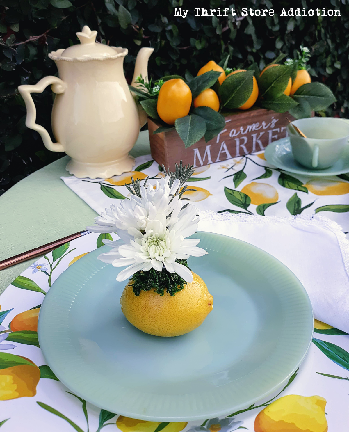 lemons and jadeite garden tablescape